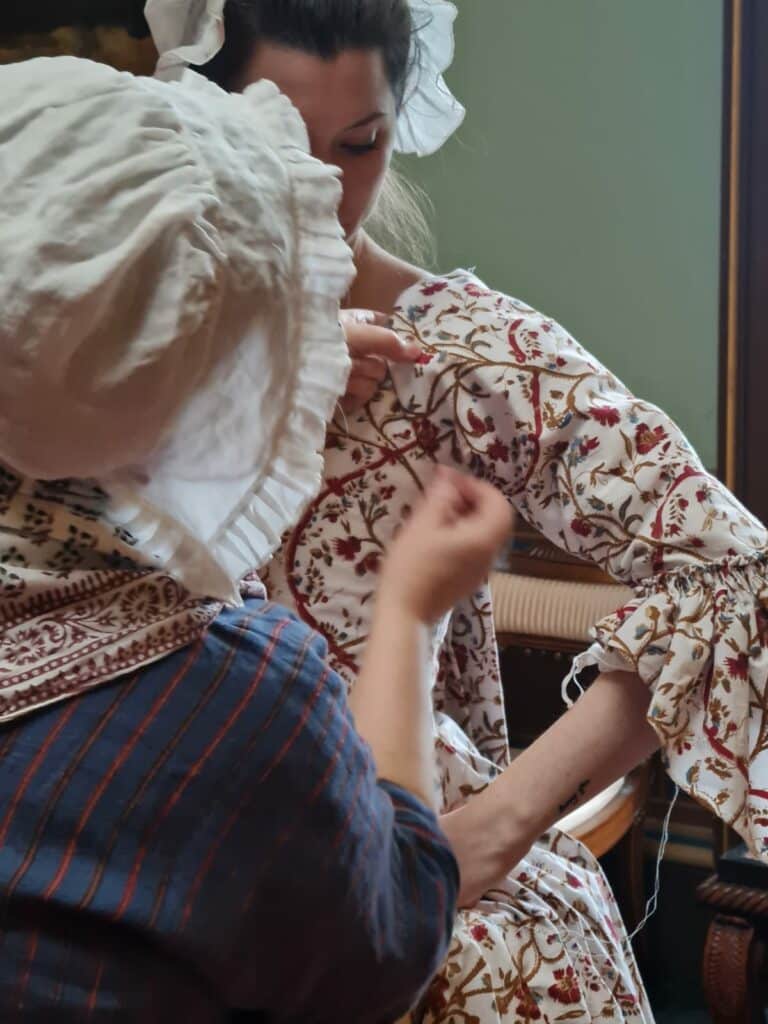 Setting sleeves. Live public programming at Paxton House, 2023. Photo credit: Fiona Salvesen Murrell.